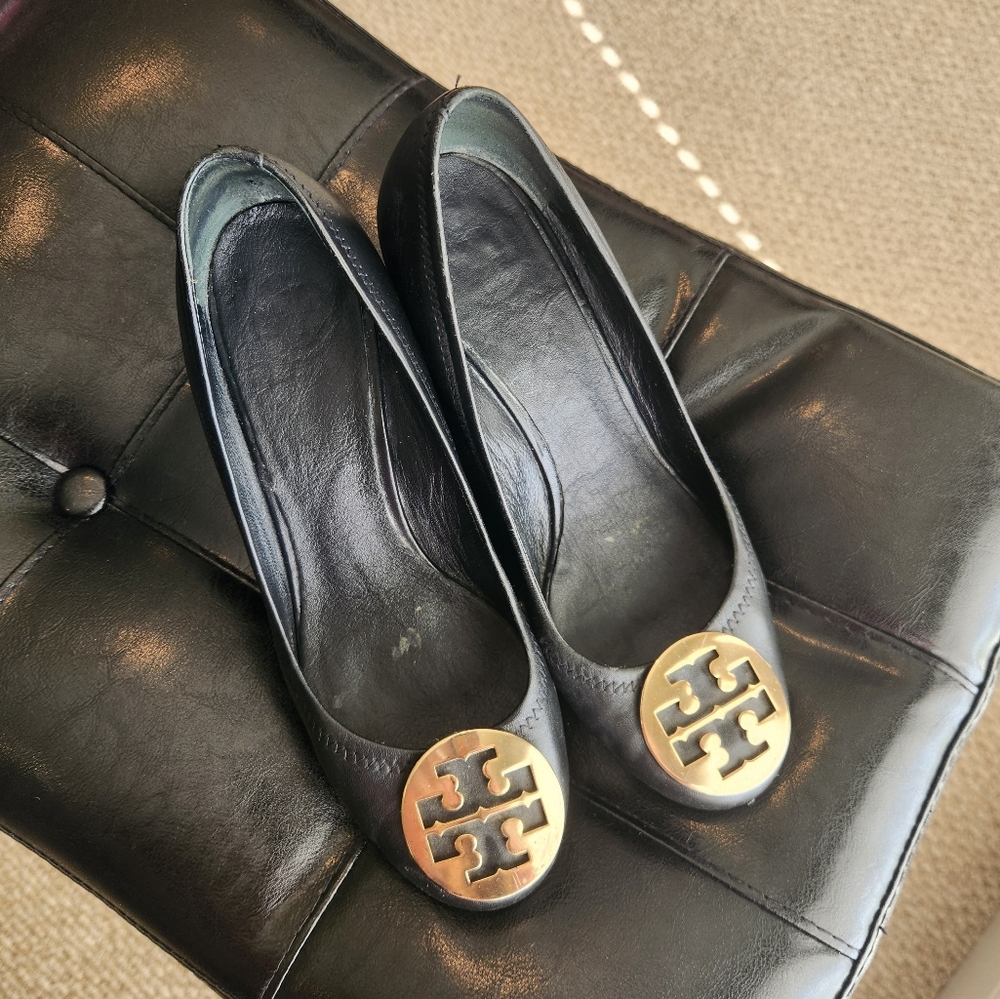 Tory Burch black leather wedges with gold hardware on top